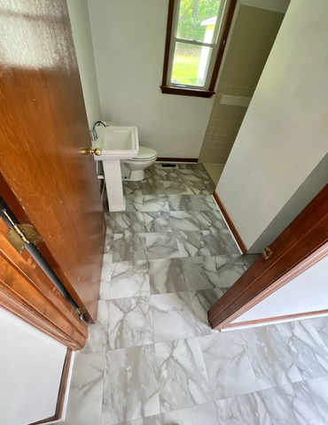 Triangle Flooring - Bathroom tile floor installation