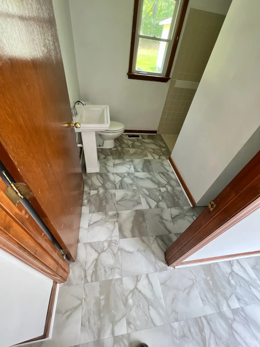 Triangle Flooring - Bathroom tile floor installation