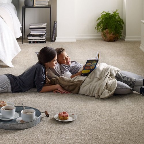 Kids reading on bedroom carpet from Triangle Flooring Center in Carrboro, North Carolina